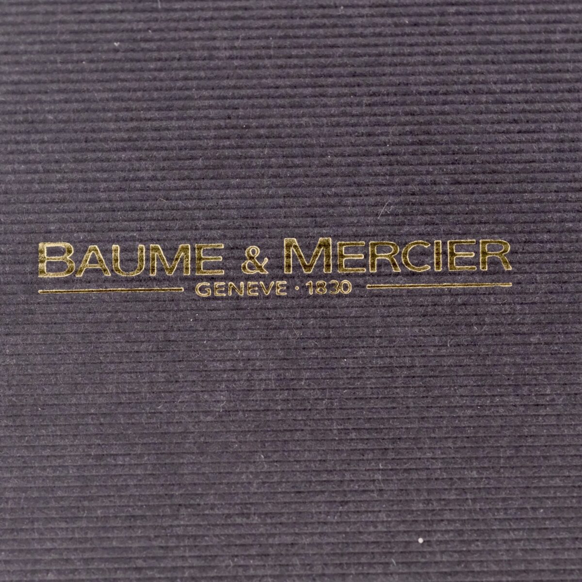 The Baume & Mercier 18k Gold Calendar Ref 15162 is a Swiss-made, 1990s timepiece featuring a 30mm 18k yellow gold case and a white dial with gold-tone markers and hands. It operates on a quartz movement, offering reliable timekeeping with a date function, small seconds sub-dial, and hack second feature. The watch is paired with a high-quality leather strap, ensuring comfort and durability. While not a chronometer, it exemplifies Baume & Mercier's exceptional craftsmanship, making it a sophisticated choice for collectors and enthusiasts.