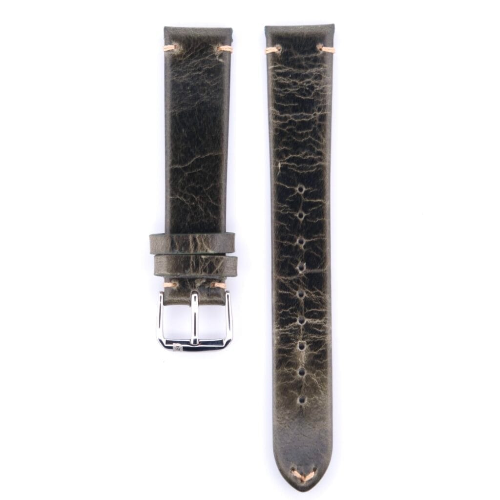 Two pieces of the Top Stitch Thin Calf Leather Watch Strap Oiled Finish in textured brown are displayed on a white background. The left piece has a silver buckle, and the right piece features multiple holes for adjustable sizing.