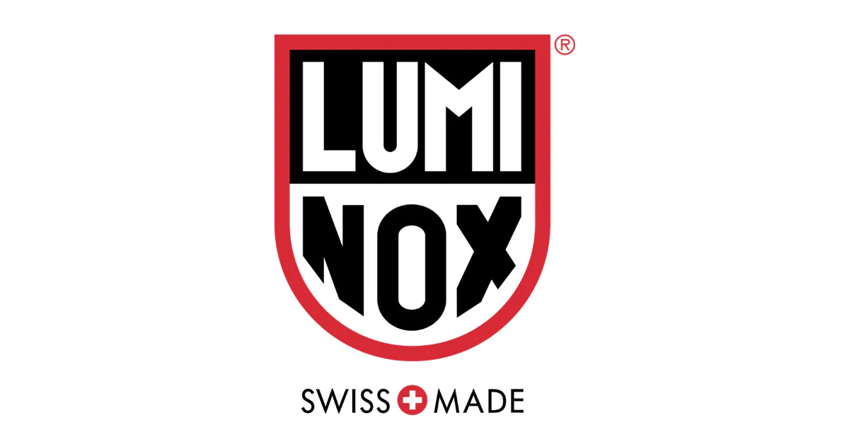 Logo of Luminox, featuring bold white text with black and red accents. The words SWISS MADE appear below, accompanied by a small red Swiss cross.