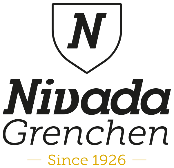 Logo of Nivada Grenchen with a shield containing the letter N above the text. Below, it says Since 1926 in yellow letters.