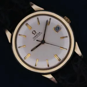 1966 Omega Automatic Date Cal. 563 wristwatch featuring a white dial, black leather strap, and date displayed as the 19th.