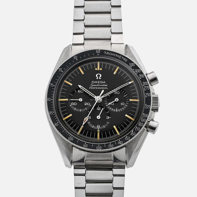 A stainless steel Omega Speedmaster 145.012 Professional wristwatch with a black dial, three subdials, tachymeter bezel, and metal link bracelet, shown against a plain light background.