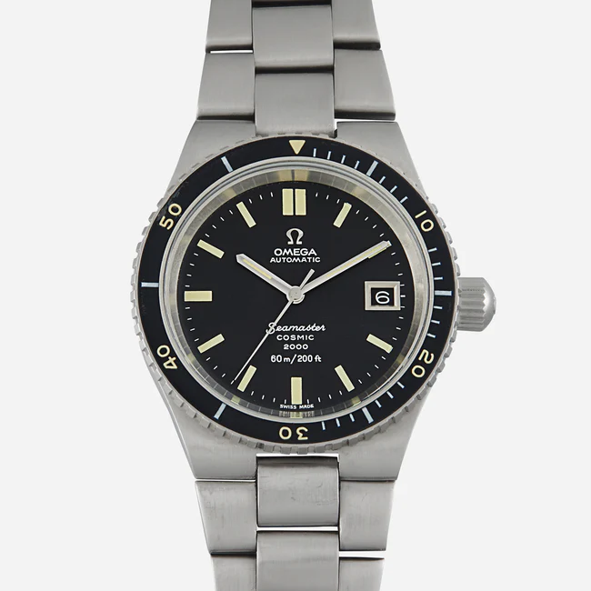 A stainless steel Omega Seamaster Cosmic 2000 166.137 wristwatch with a black dial, luminous hour markers, date window at 3 oclock, rotating bezel, and metal bracelet, photographed against a plain background.