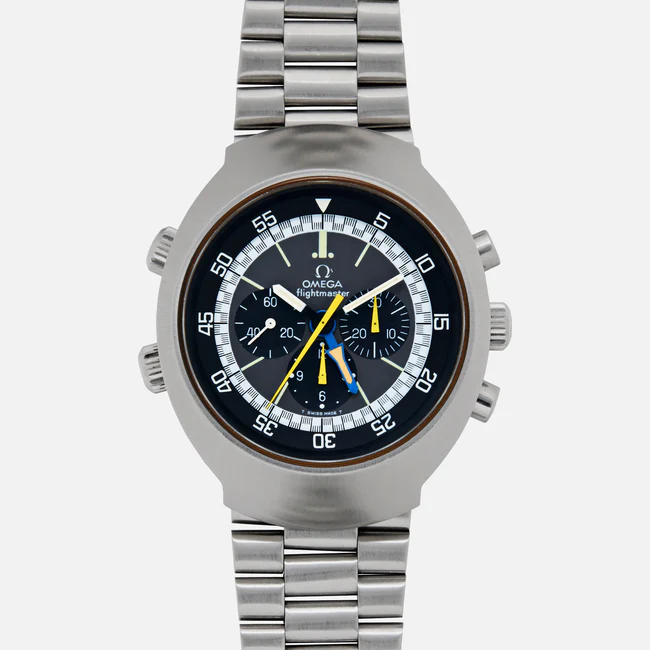 A stainless steel wristwatch with a round black dial, multiple subdials, three pushers, and a metal link bracelet. The Omega Flightmaster 145.036 displays white, yellow, and blue hands on its face marked OMEGA Flightmaster.