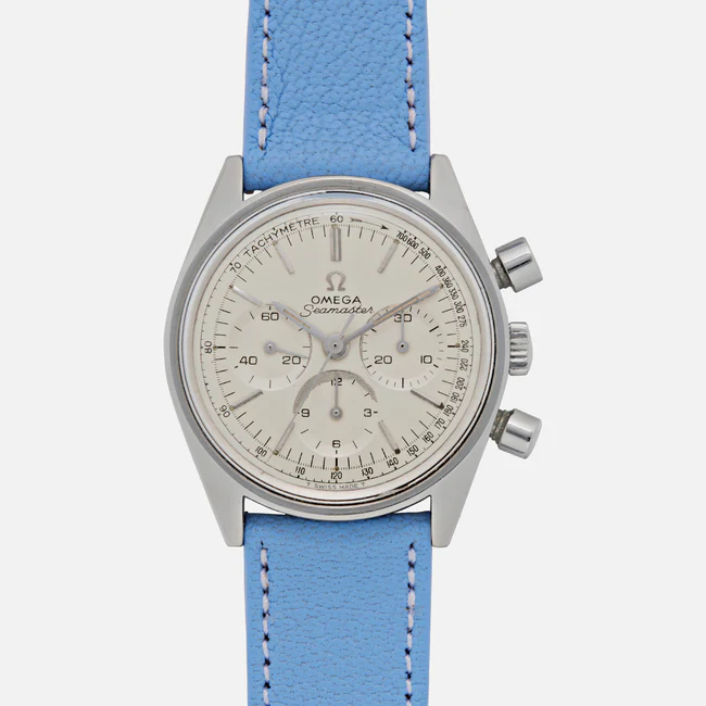 A silver Omega Chronograph 145.018 Seamaster wristwatch with three subdials, a white dial, and a light blue leather strap, photographed against a plain white background.