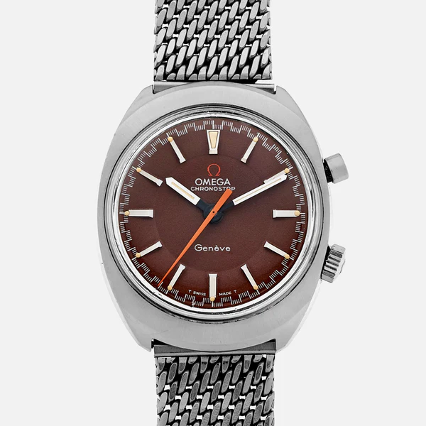 A silver Omega Chronostop 145.009 Genève wristwatch with a brown dial, white hour markers, two crowns on the right side, and a silver mesh band, shown on a plain light background.