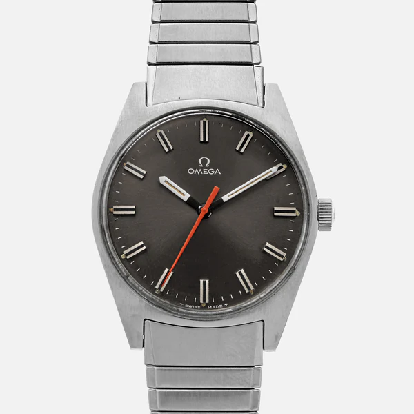 A silver Omega Geneve 135.041 wristwatch with a black dial, silver hour markers and hands, and a red second hand. The metal link bracelet complements its simple, classic design.