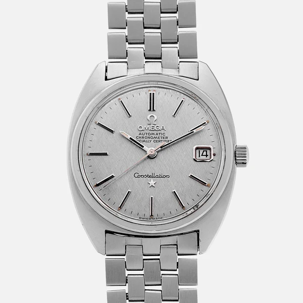 A silver Omega Constellation 168.012 wristwatch with a round face, metal link band, simple black hour markers, date window at 3 o’clock, and the words Constellation and Chronometer on the dial.