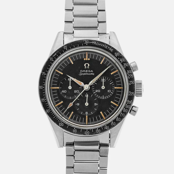 A vintage Omega Speedmaster CK2998 wristwatch with a black dial, three subdials, silver hour markers, and a stainless steel bracelet, photographed on a plain white background.