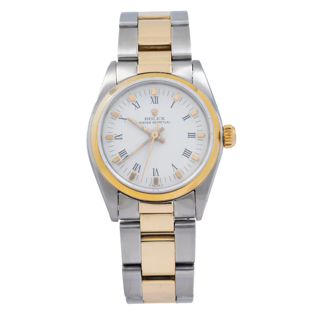 Two-tone Rolex Oyster Perpetual wristwatch featuring a white dial with Roman numerals and a 6748 silver and gold metal bracelet.