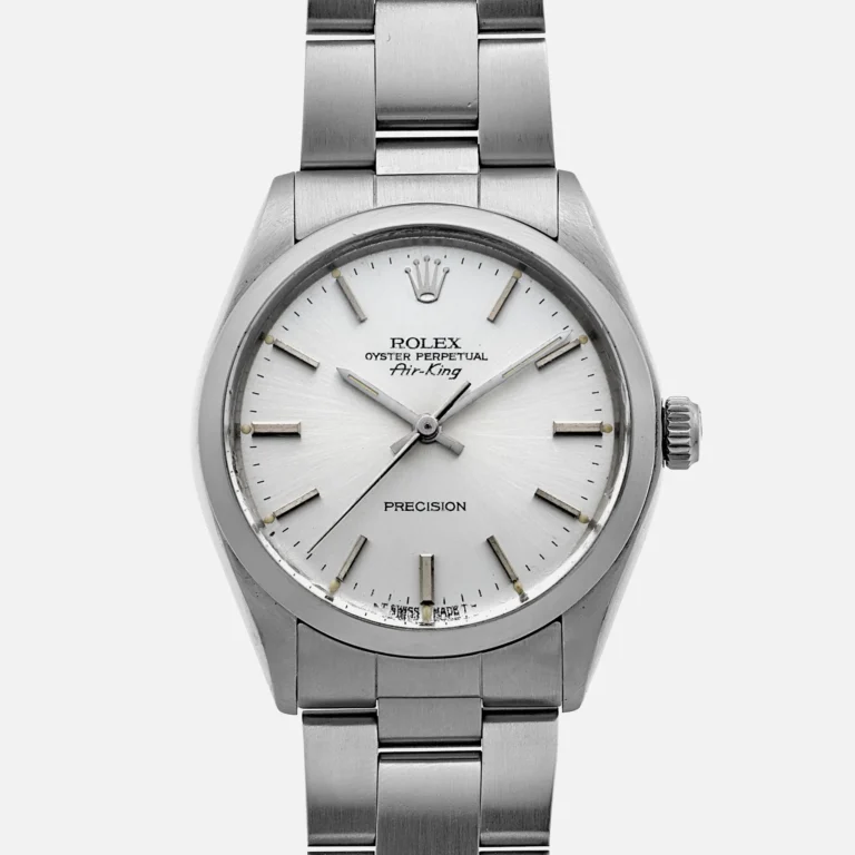 Silver Rolex Oyster Perpetual Air-King 5500 watch with a white dial and stainless steel bracelet, inspired by the classic style of the Rolex Explorer.