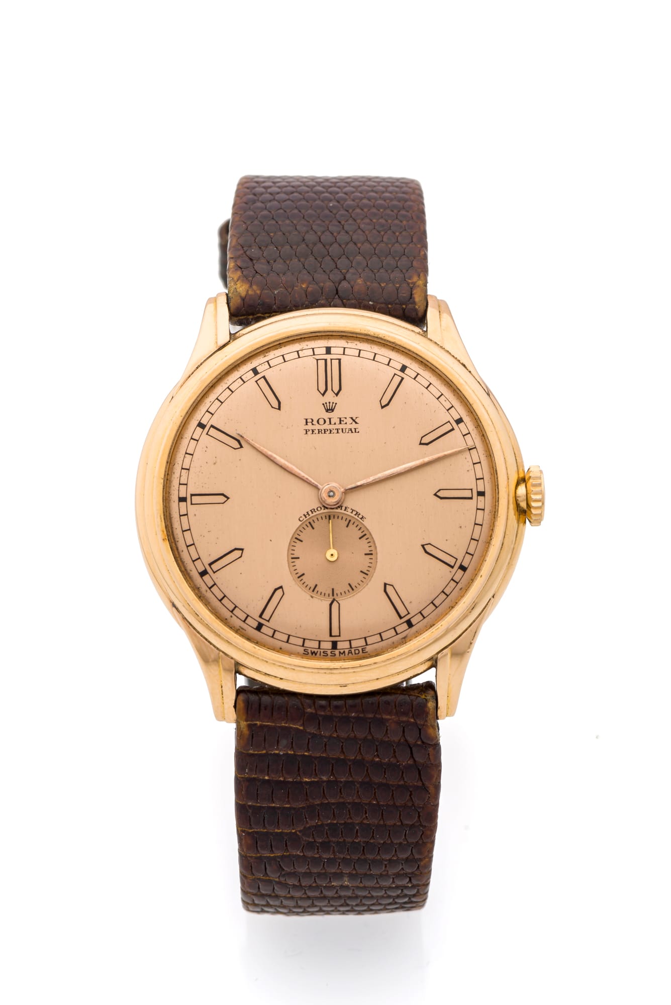 Gold vintage Rolex Oyster Perpetual wristwatch, model 4021, featuring a brown textured leather strap on a white background.