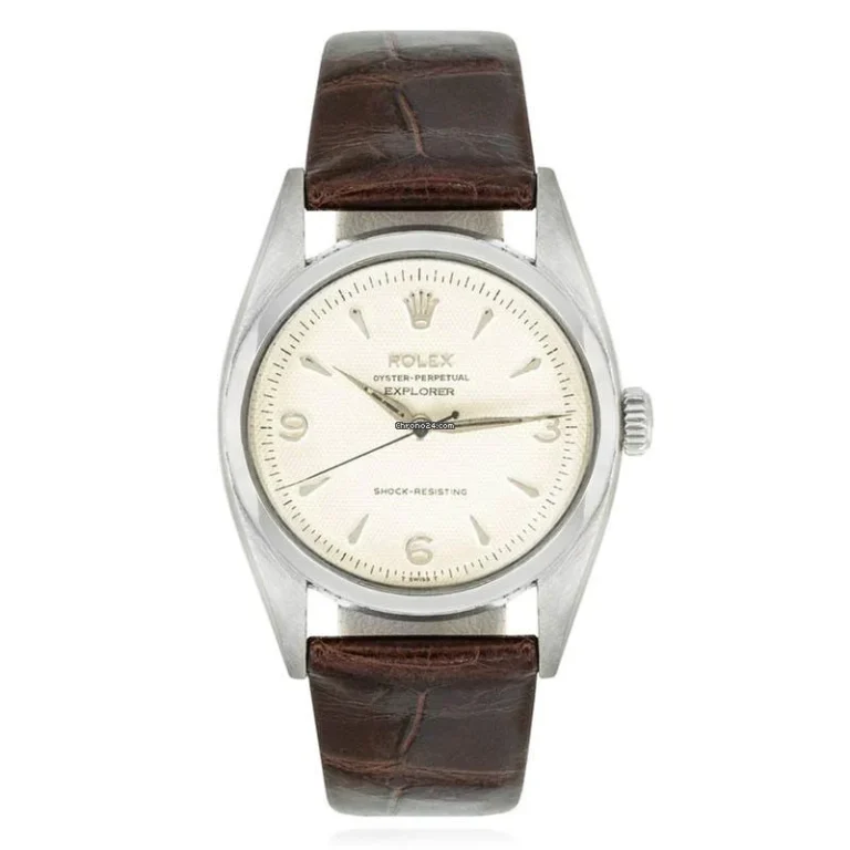Rolex Explorer 6298 watch with a brown leather strap and a silver case, featuring a white dial and simple hour markers.