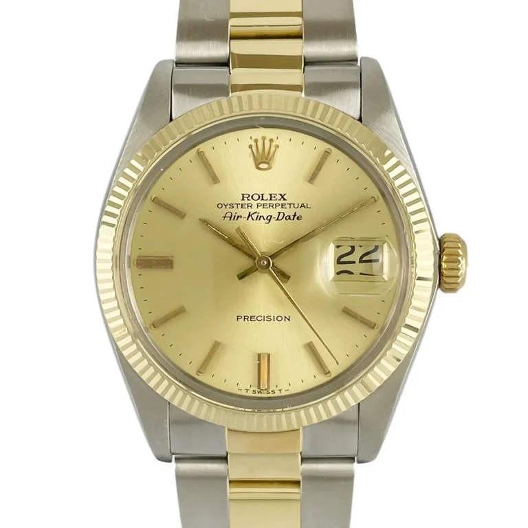 Gold and silver Rolex Air King 5701 Oyster Perpetual watch showing the date as the 22nd.