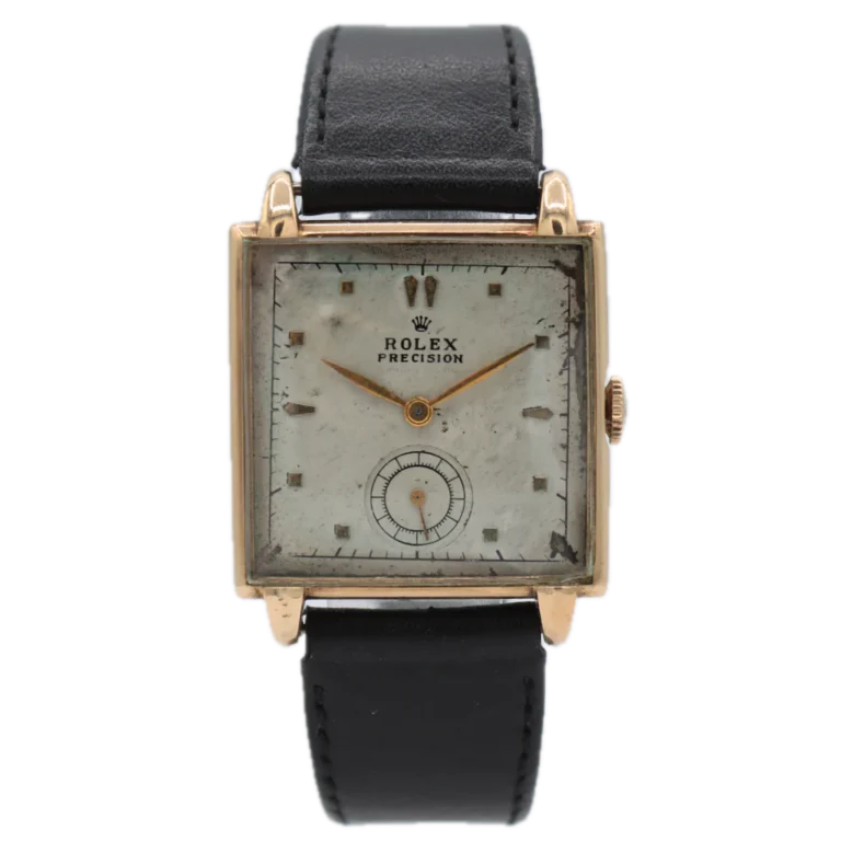 Vintage square Rolex Precision 4330 watch with a worn white dial, gold case, and black leather strap.