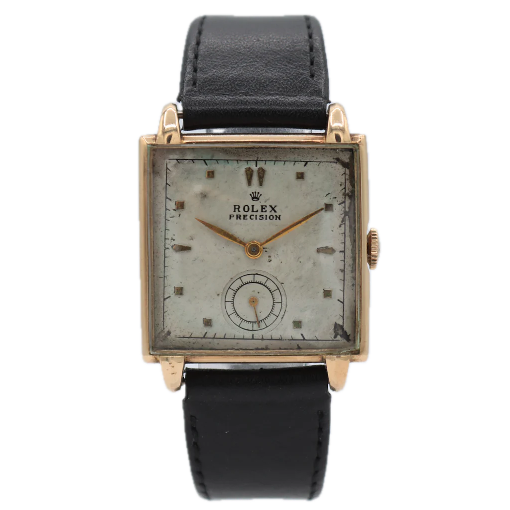 Vintage square Rolex Precision 4330 watch with a worn white dial, gold case, and black leather strap.