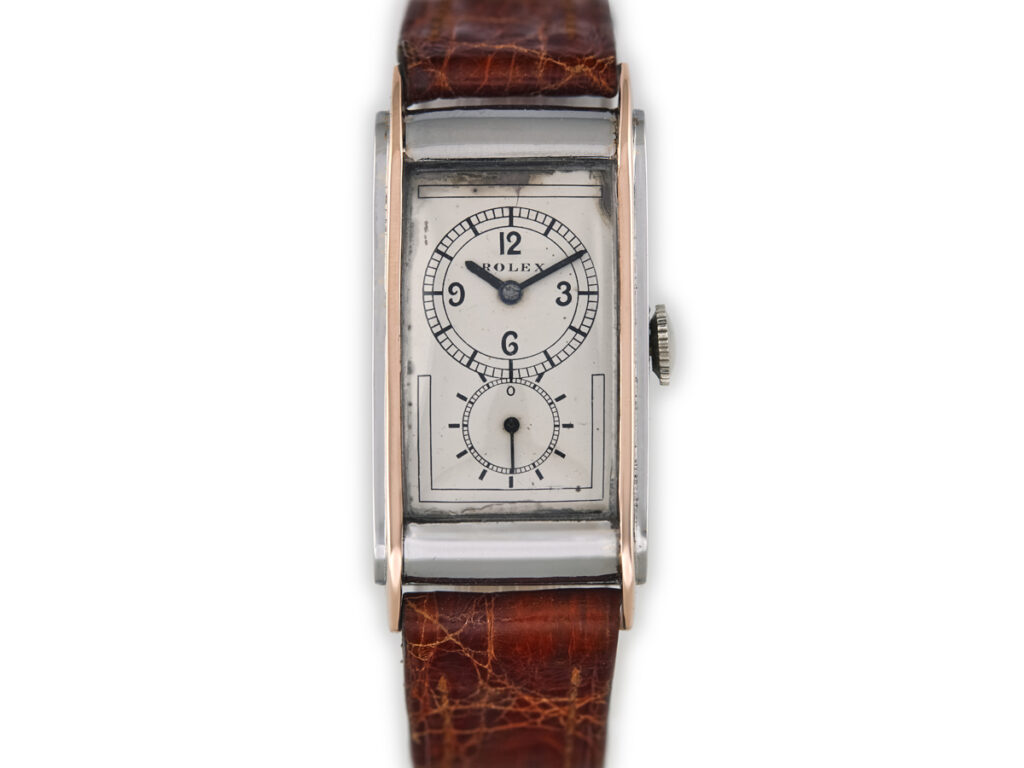 Rectangular vintage Rolex Prince with a brown leather strap and white dial displaying two subdials—a true luxury watch for discerning collectors.