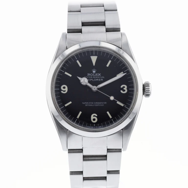Stainless steel Rolex Explorer 1016 watch with a black dial and silver hour markers on a metal bracelet.
