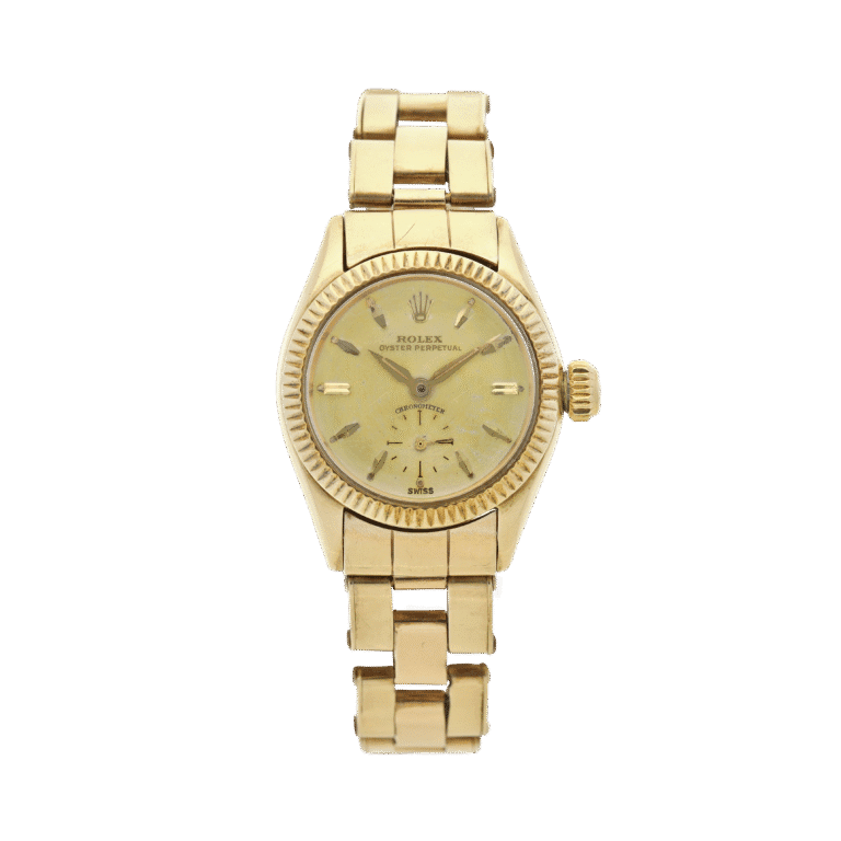 Gold Rolex Oyster Perpetual wristwatch, model 6509, featuring a metal link band and a round champagne-colored dial, shown on a plain background.