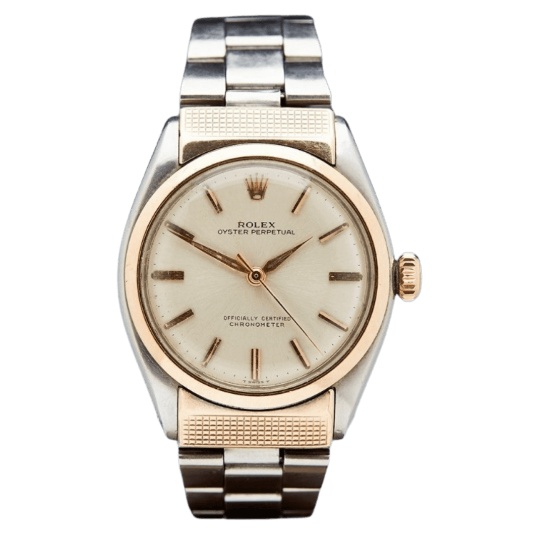 A vintage Rolex Oyster Perpetual 6119 watch with a two-tone metal band and a cream-colored dial.