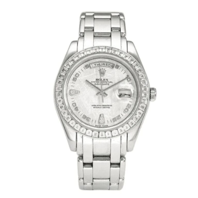 A luxury watch, this silver Rolex Day-Date features a diamond bezel and day-date display on a sleek metal link band.