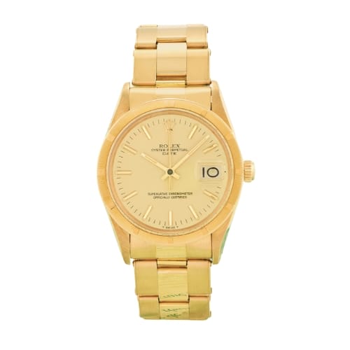 Gold Rolex Oyster Perpetual Date 15018 wristwatch with a round dial, date display, and metal link bracelet, shown on a white background.