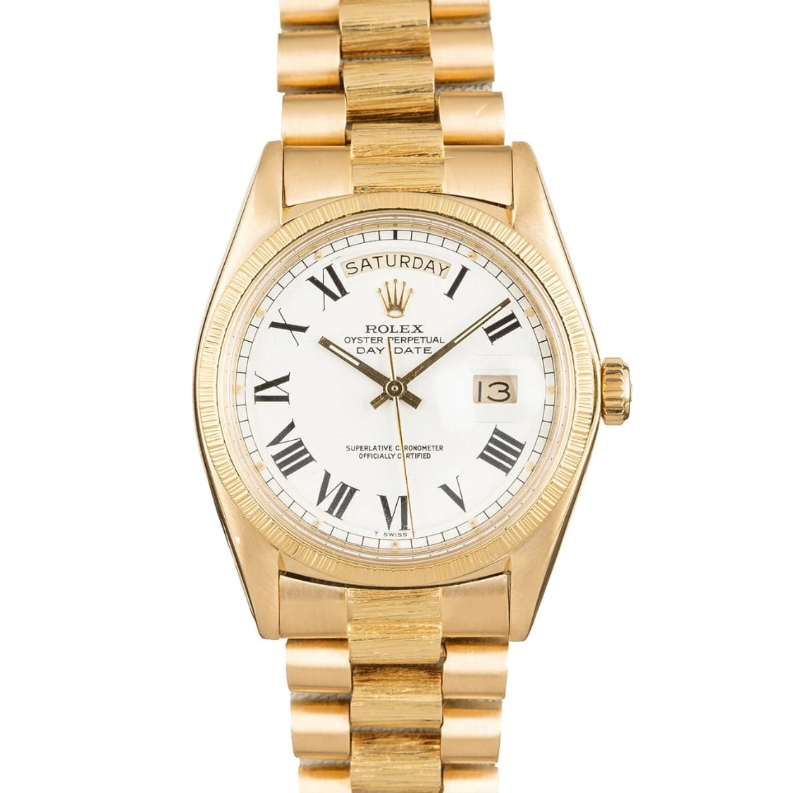 Gold Rolex Day-Date President 1807 watch with a white dial, Roman numerals, and day and date display on a gold bracelet.