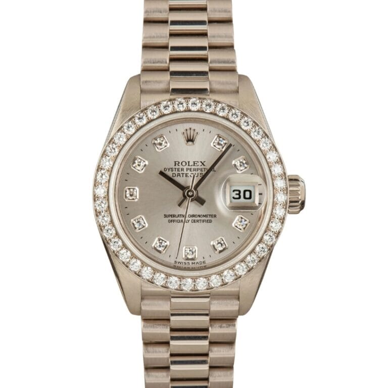 Silver Rolex Datejust 79179 watch with diamond hour markers and a diamond bezel, featuring a date display at 3 o’clock.
