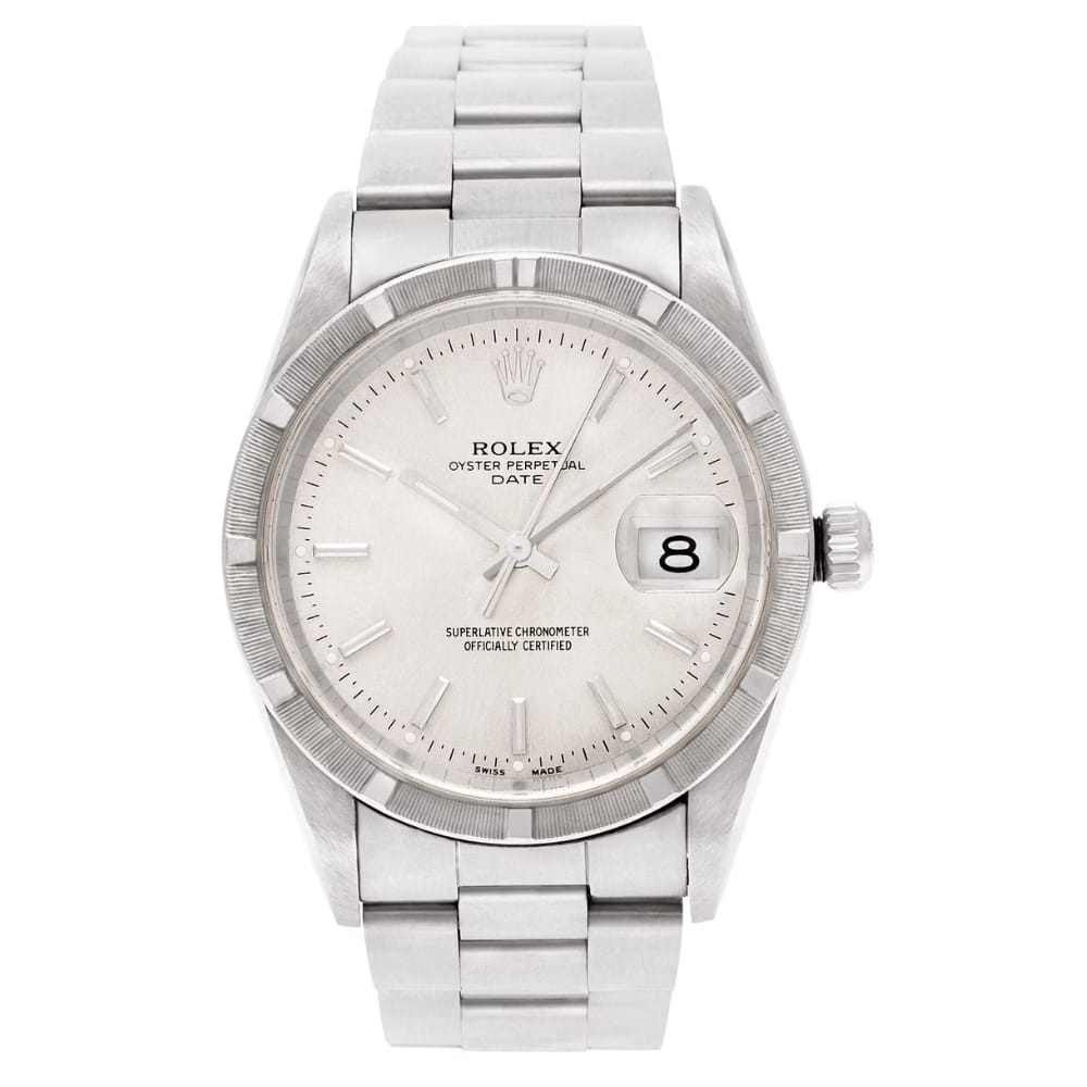 Silver Rolex Oyster Perpetual Date 1521 watch with a white dial, date window, and metal bracelet.