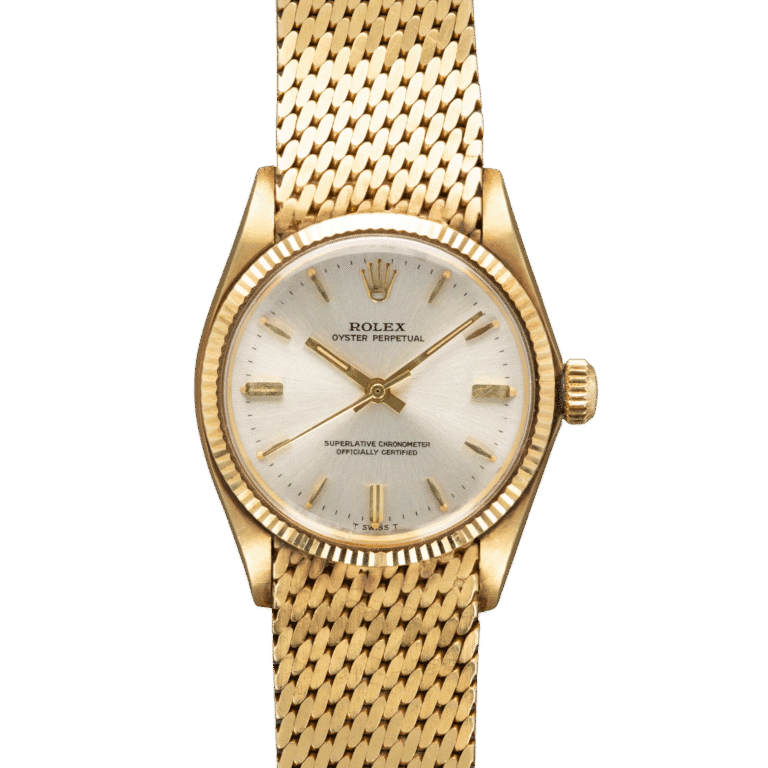 A gold Rolex Oyster Perpetual 6551 wristwatch with a mesh bracelet and silver dial displayed on a plain background.