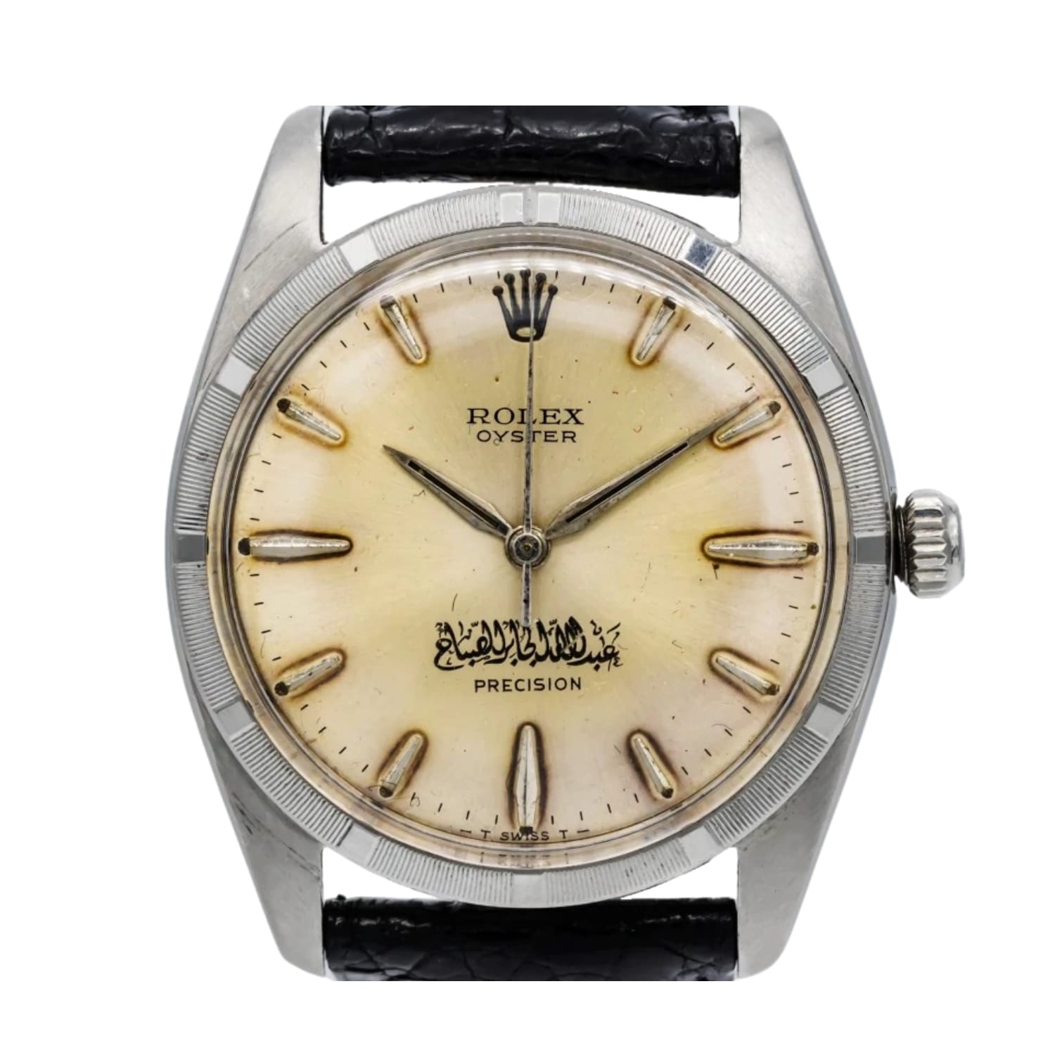 A vintage Rolex Oyster Precision watch with Arabic script on a cream dial and a black leather strap, this classic timepiece is a fine example of the sought-after Rolex 6425 model.