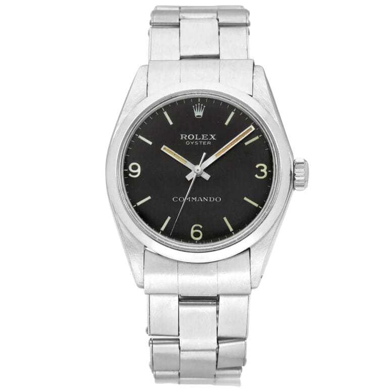 Silver Rolex Oyster Commando watch featuring a black dial, silver hands, and a metal link bracelet—an iconic addition to the Rolex 6429 collection.