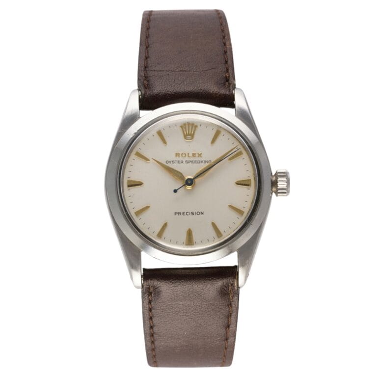 A vintage Rolex Speedking 6421 with a brown leather strap and silver case, this classic Rolex Oyster timepiece exudes timeless style.