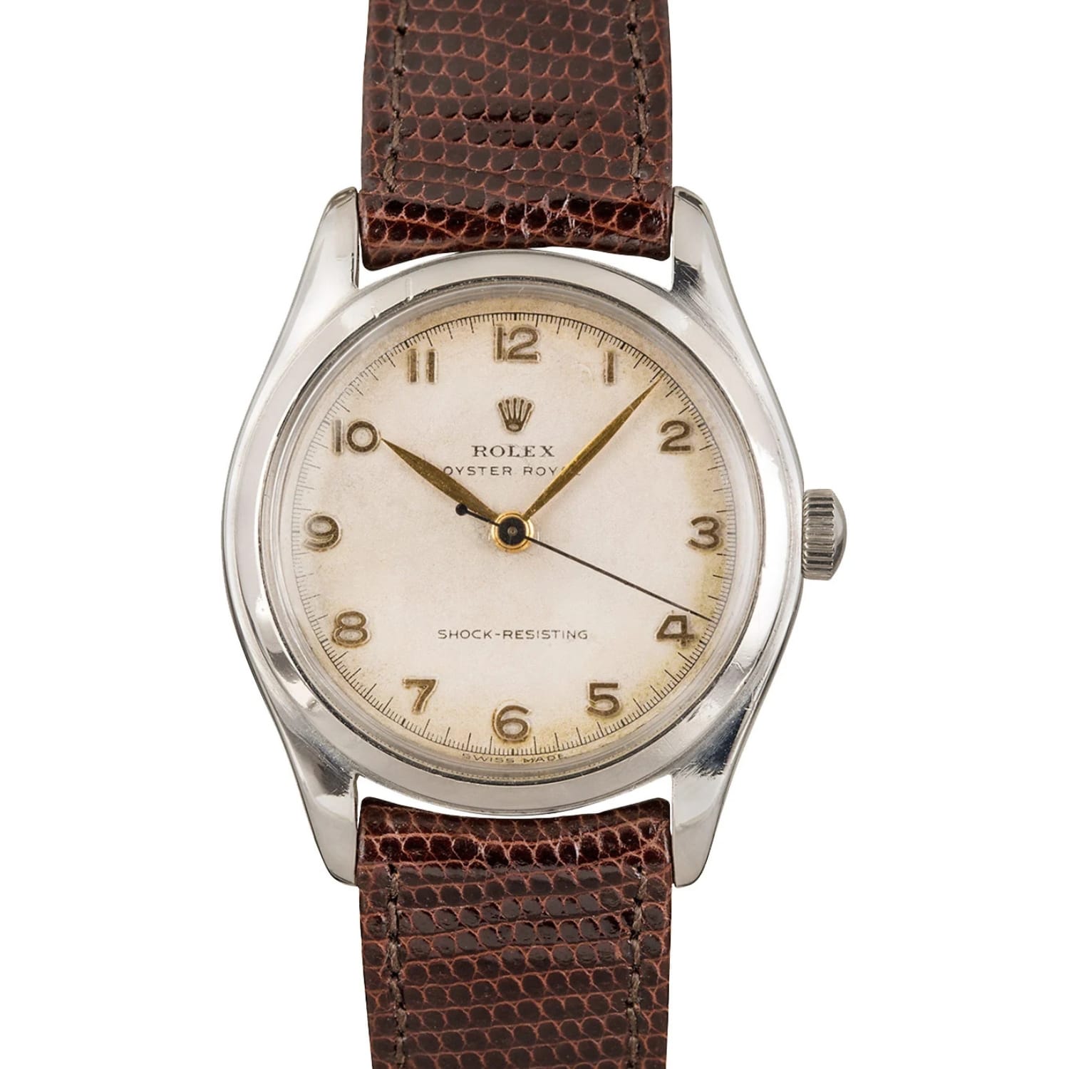 Vintage Rolex Oyster Royal 6144 watch with a brown leather strap and cream dial displaying gold Arabic numerals.