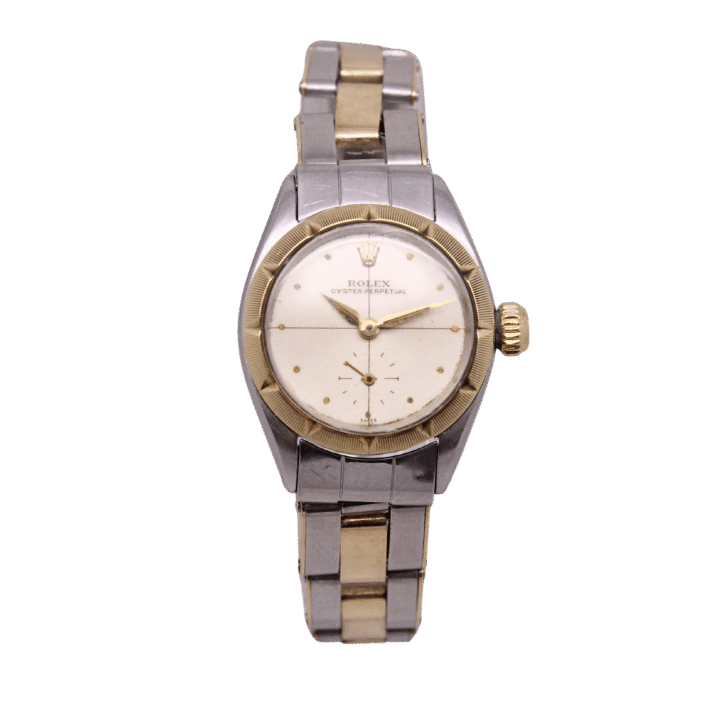 Vintage Rolex Oyster Perpetual 6503 watch with a two-tone metal band and a white dial, isolated on a blue background.