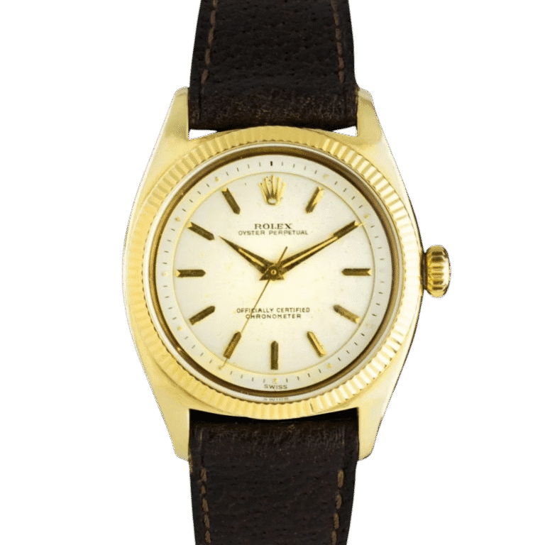 A gold Rolex Oyster Perpetual wristwatch with a white dial, gold hour markers, and a dark brown leather strap.