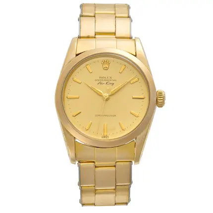 Gold Rolex Oyster Perpetual Air-King 5502 watch with a gold dial and metal bracelet, shown on a white background.