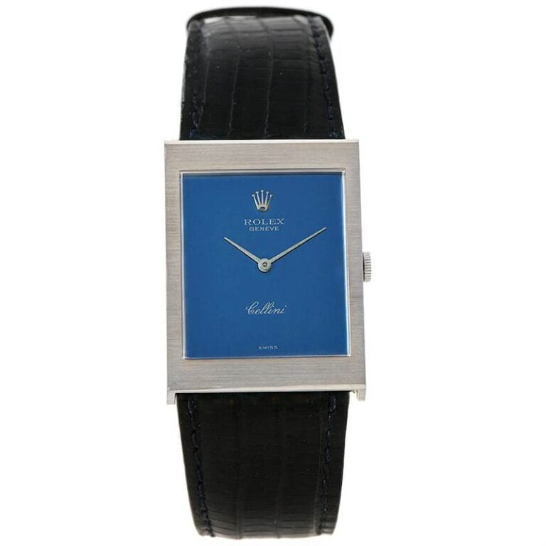 A rectangular Rolex Cellini 4027 watch with a blue face and black leather strap.