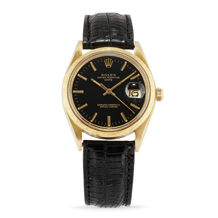 Gold Rolex Oyster Perpetual watch with a black dial, date display, and black leather strap, shown on a white background.