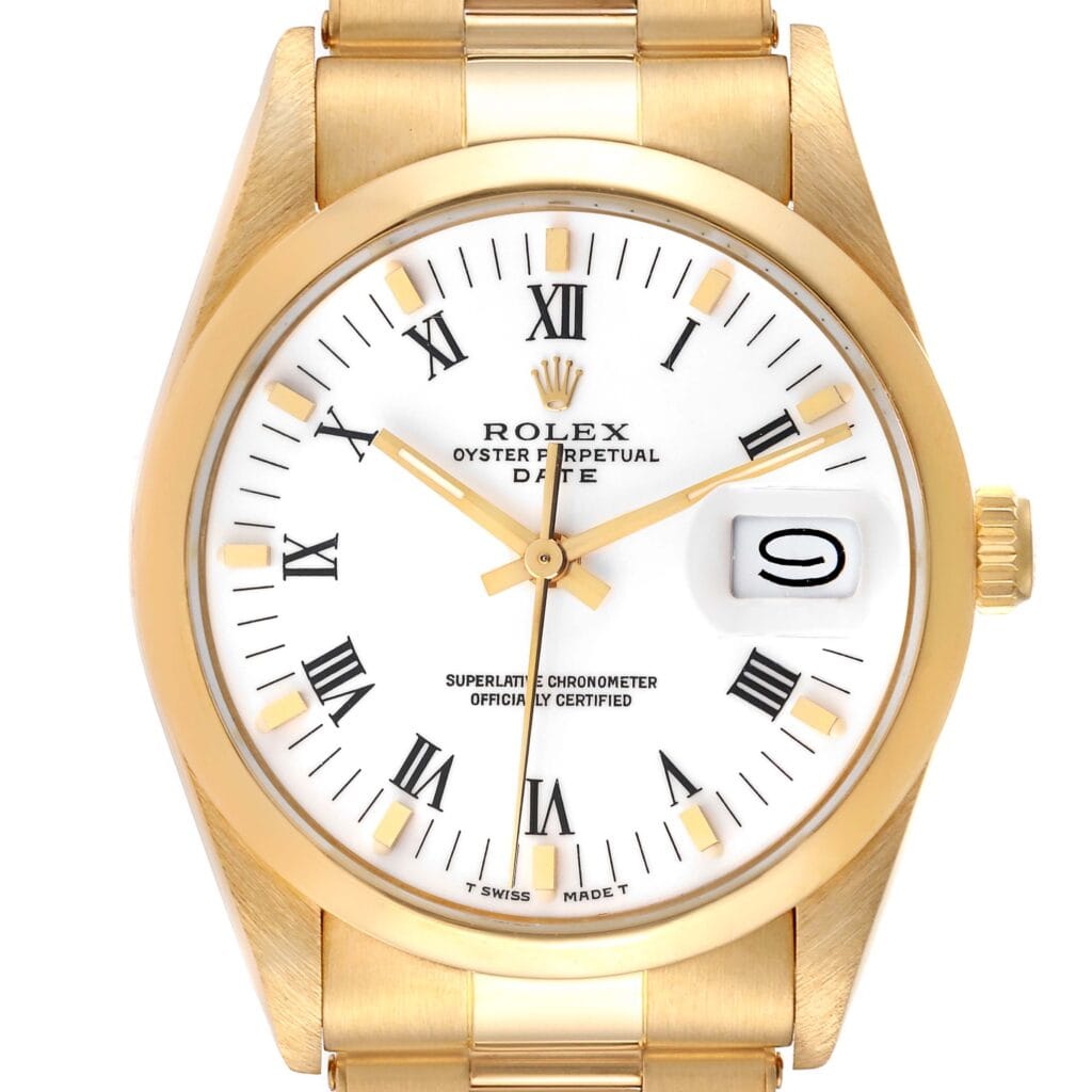 Gold Rolex Oyster Perpetual Date 15008 watch featuring a white dial, Roman numerals, and a magnified date window displaying the number nine.