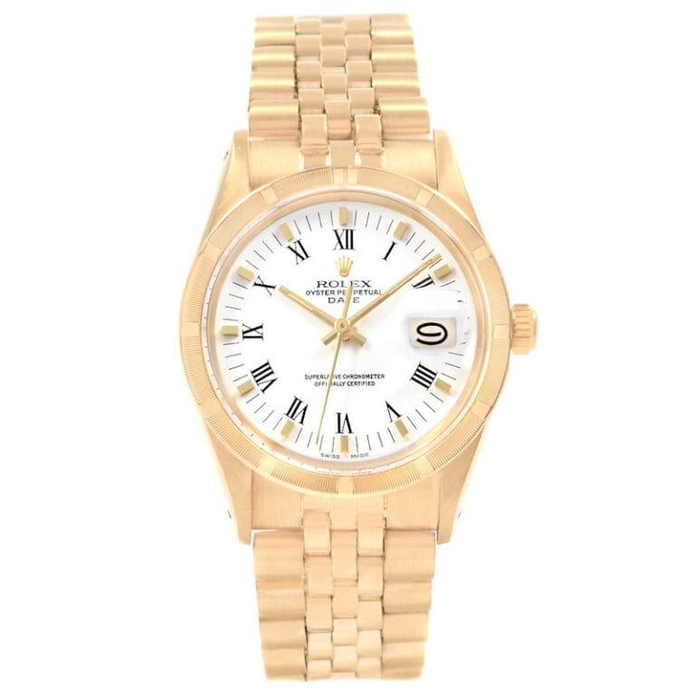 Gold Rolex Oyster Perpetual Date 15017 watch with a white face, Roman numeral markers, and a date display at 3 oclock.