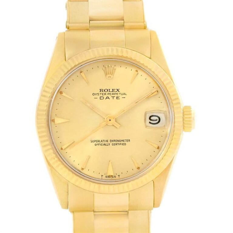 Gold Rolex Oyster Perpetual Date 6627 watch featuring a gold dial, gold bracelet, and a distinctive date window displaying the number 9.