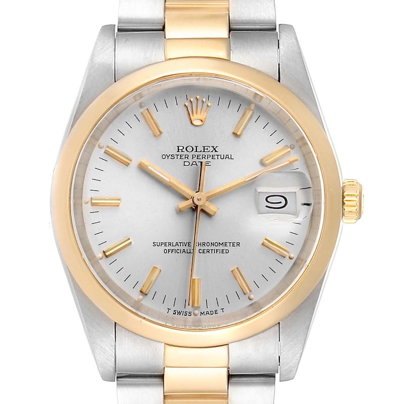 The Rolex Oyster Perpetual Date 15003 features a silver dial, gold markers, and a striking two-tone gold and steel band.