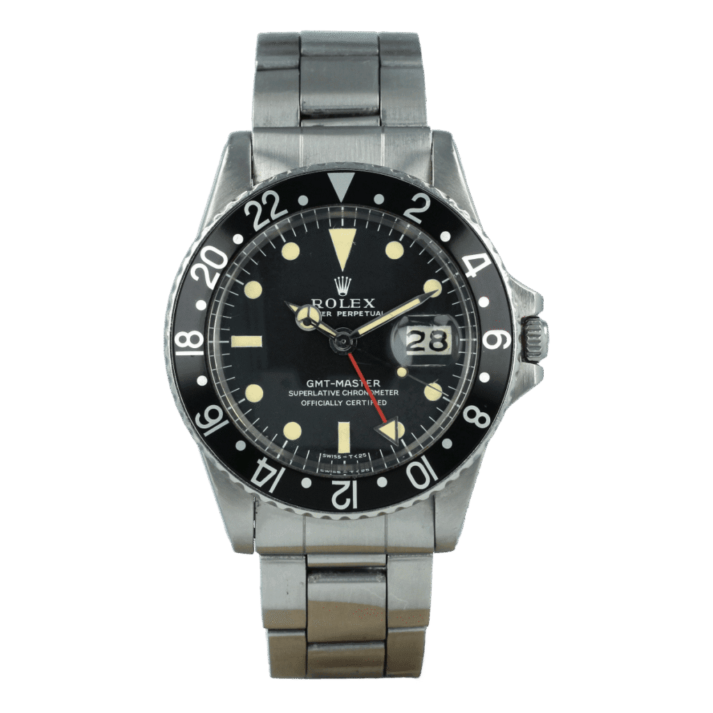 A vintage Rolex GMT-Master 1675 watch with a black bezel, black dial, and a stainless steel bracelet.