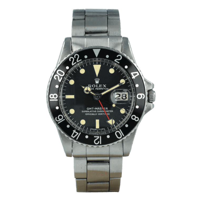 A vintage Rolex GMT-Master 1675 watch with a black bezel, black dial, and a stainless steel bracelet.