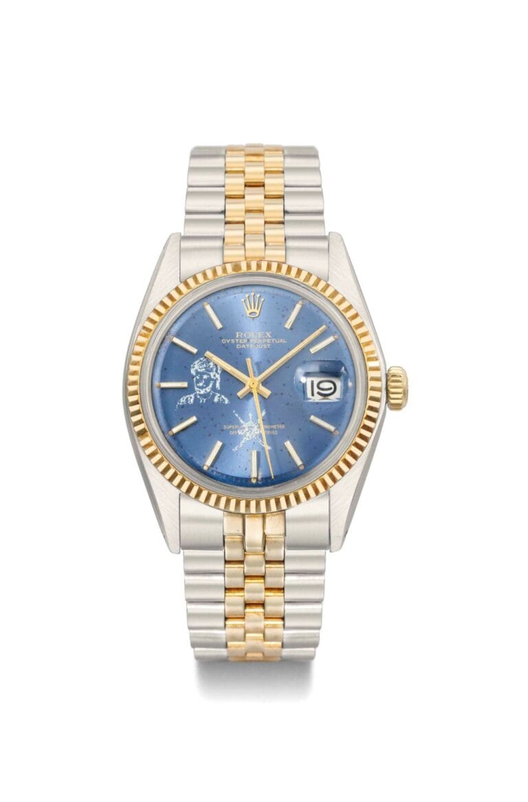 A two-tone Rolex Oyster Perpetual Date watch, model 6301, featuring a blue dial, gold bezel, and a silver and gold bracelet.