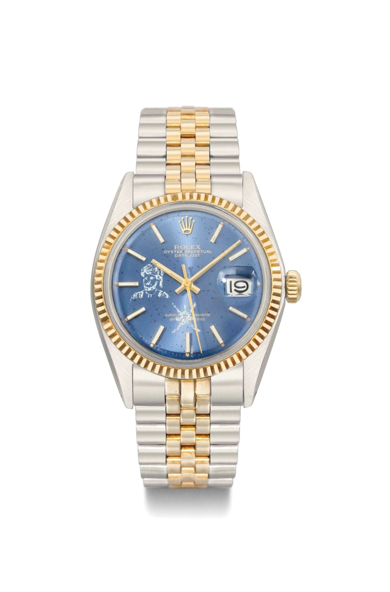 A two-tone Rolex Oyster Perpetual Date watch, model 6301, featuring a blue dial, gold bezel, and a silver and gold bracelet.