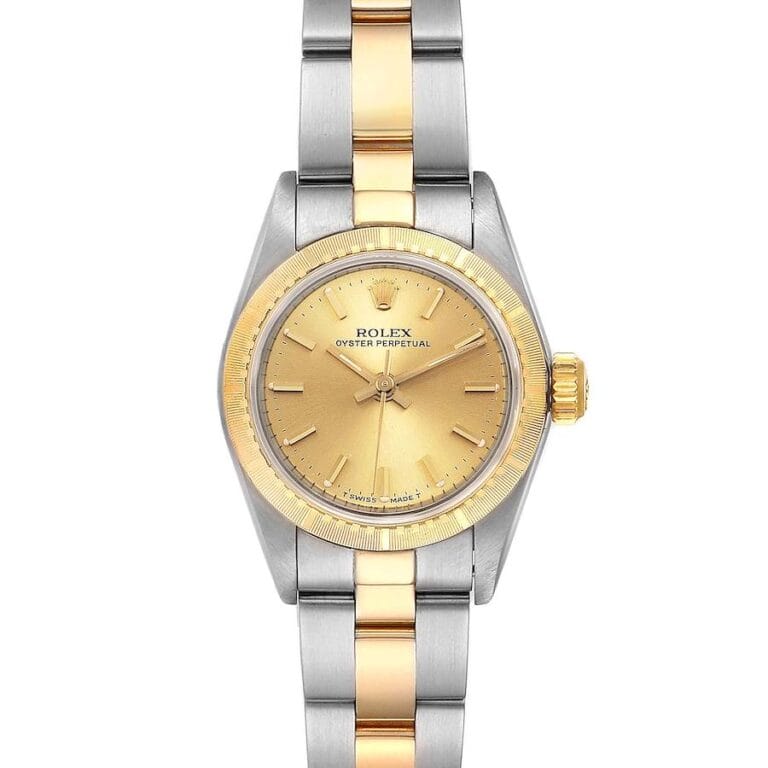 A striking Rolex Oyster Perpetual 67243 watch featuring a gold dial and a two-tone silver and gold bracelet, perfect for timeless elegance.
