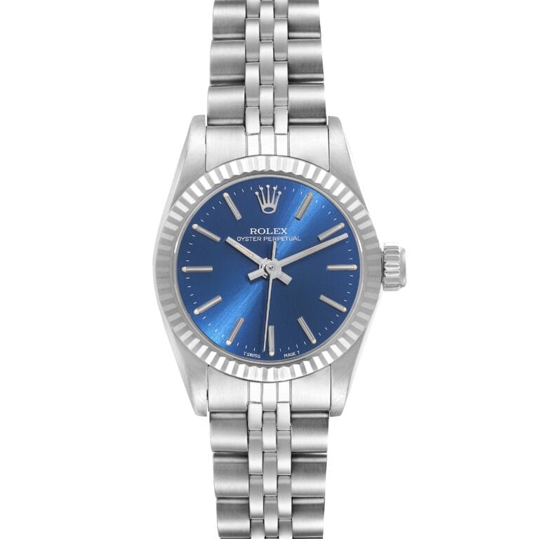 Silver Rolex Oyster Perpetual watch, model 67194, featuring a blue dial, metal strap, and silver hour markers, displayed on a white background.