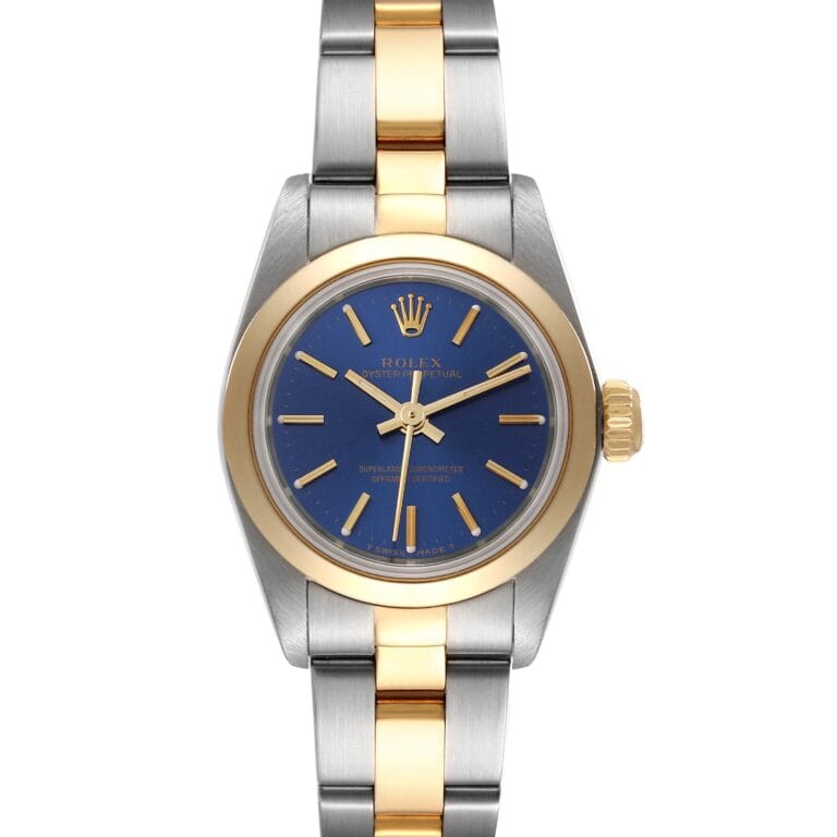 A Rolex Oyster Perpetual 67183 with a blue dial, gold bezel, and a striking silver-gold two-tone metal bracelet.